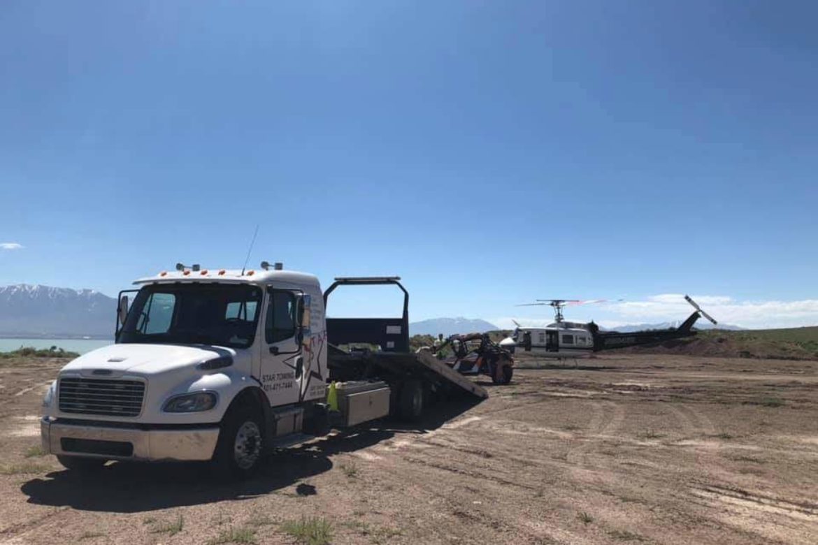 White Lightning with wrecked UTV and Huey Helicopter 2