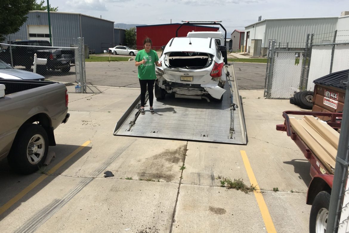 White Lightning with wrecked car and Ry