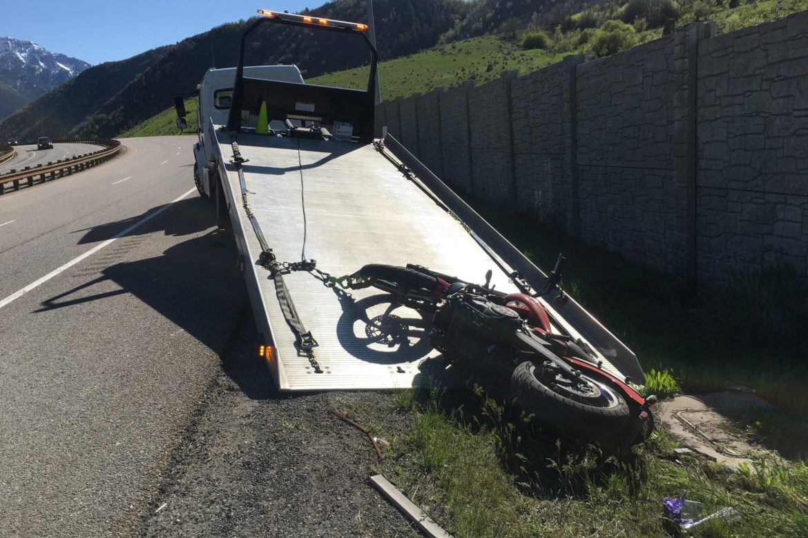 White Lightning with wrecked motorcycle
